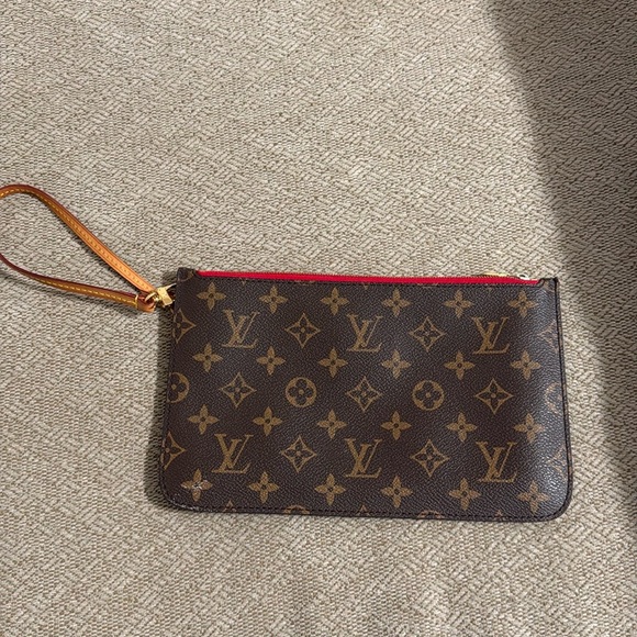 Louis Vuitton  Neverfull Clutch - Picture 1 of 5